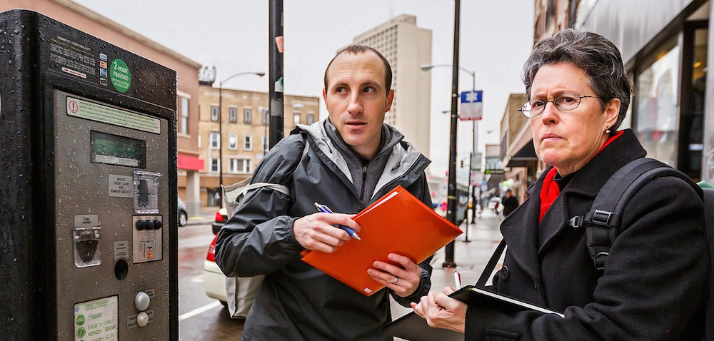 A student and professor conduct field research in Chicago