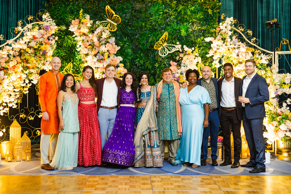 Kaleb and  Anita Amber Joshi, MPP’19 at their wedding surrounded by fellow Harris Alumni