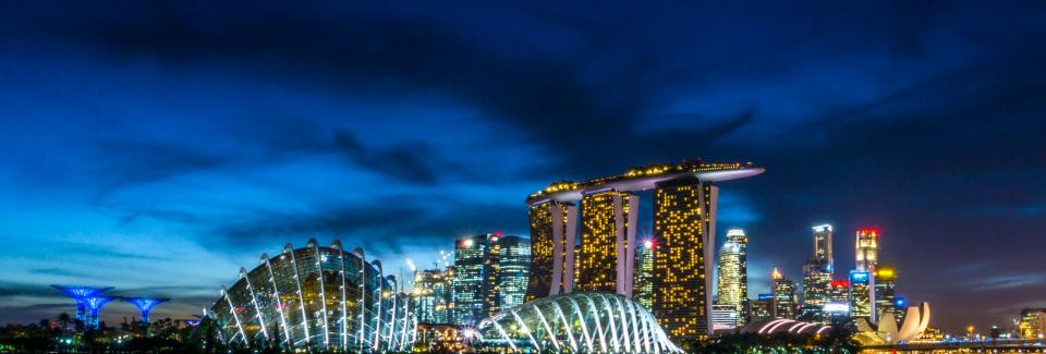 Singapore skyline at night by Mike Enerio