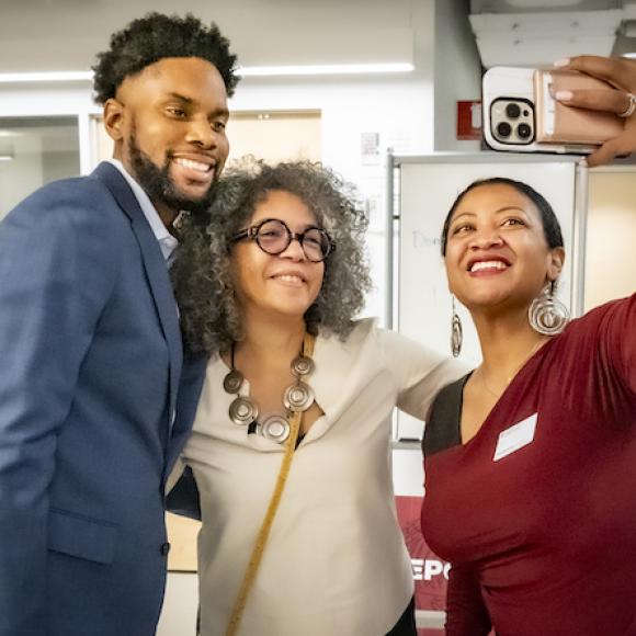 A photo of Damon Jones and others.