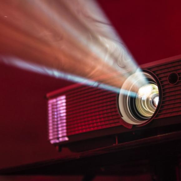 An image projector. Photo by Alex Litvin on Unsplash