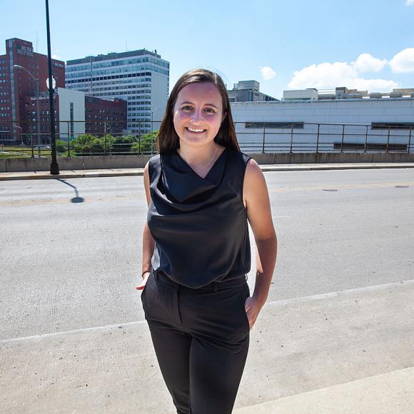 Irene Burke standing on the sidewalk