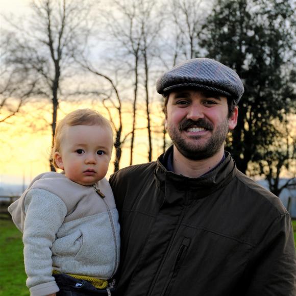 Domingo Carbone with one year old son