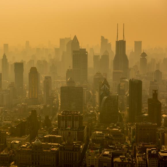 A photo of the city of Shanghai in clouds of pollution.