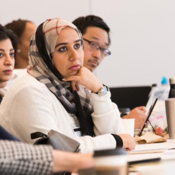 students listen intently in class