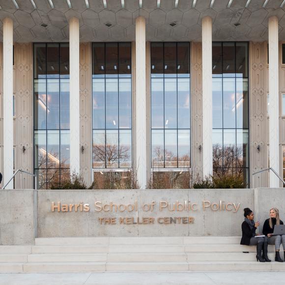 Students sitting on the Keller Center's front steps