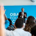 A photo of President Obama addressing a crowd.